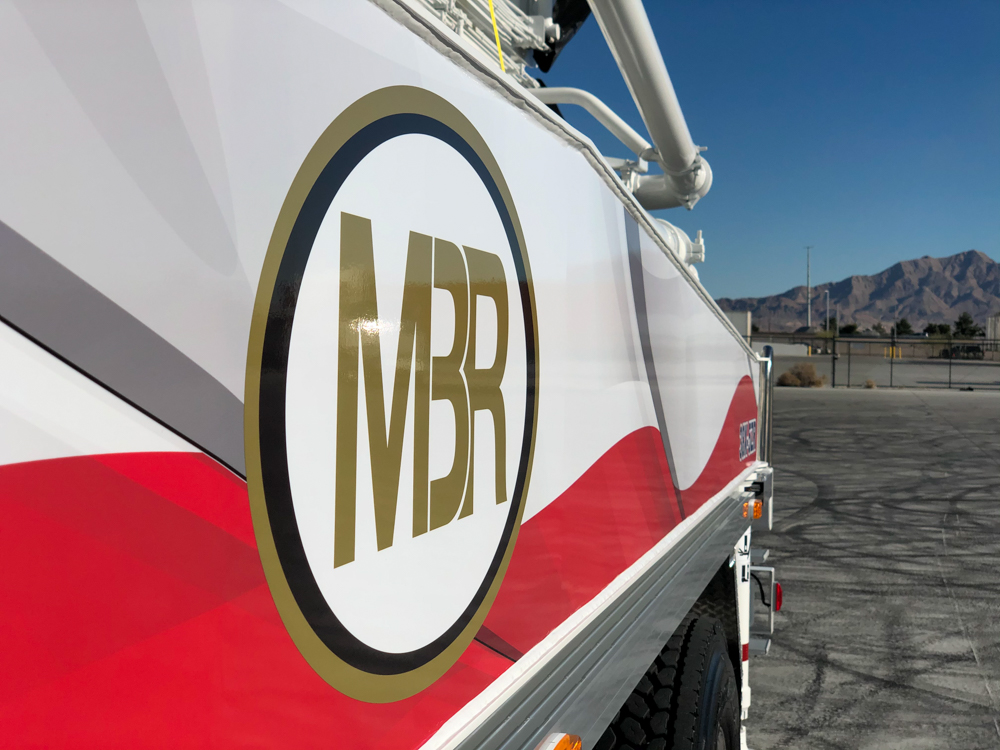 MBR logo on the side of their concrete boom pump