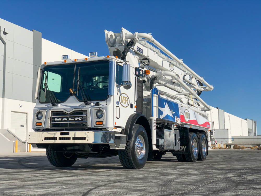 MBR concrete boom pump with a mack chassis and Texas flag design
