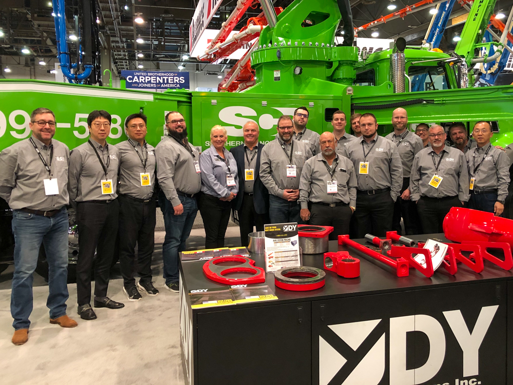 the DY Concrete Pumps team at the World of Concrete event