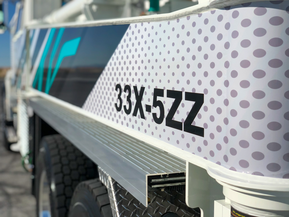 33X-5ZZ model number on the side of a DY Concrete Pumps boom pump