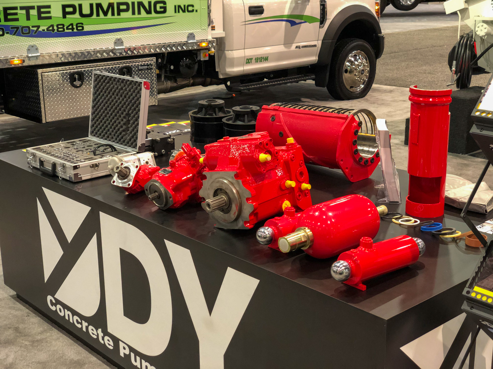 DY Concrete Pumps pump parts on display at the World of Concrete event