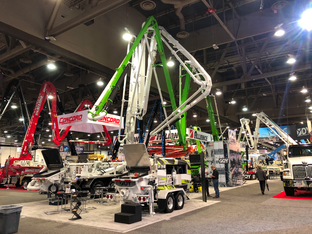 DY concrete pump on display inside of the WOC event