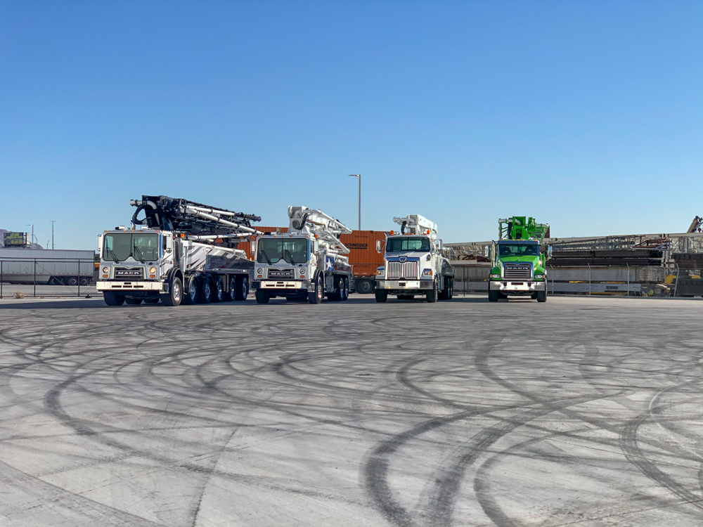 four different DY concrete pumps on display at the WOC event